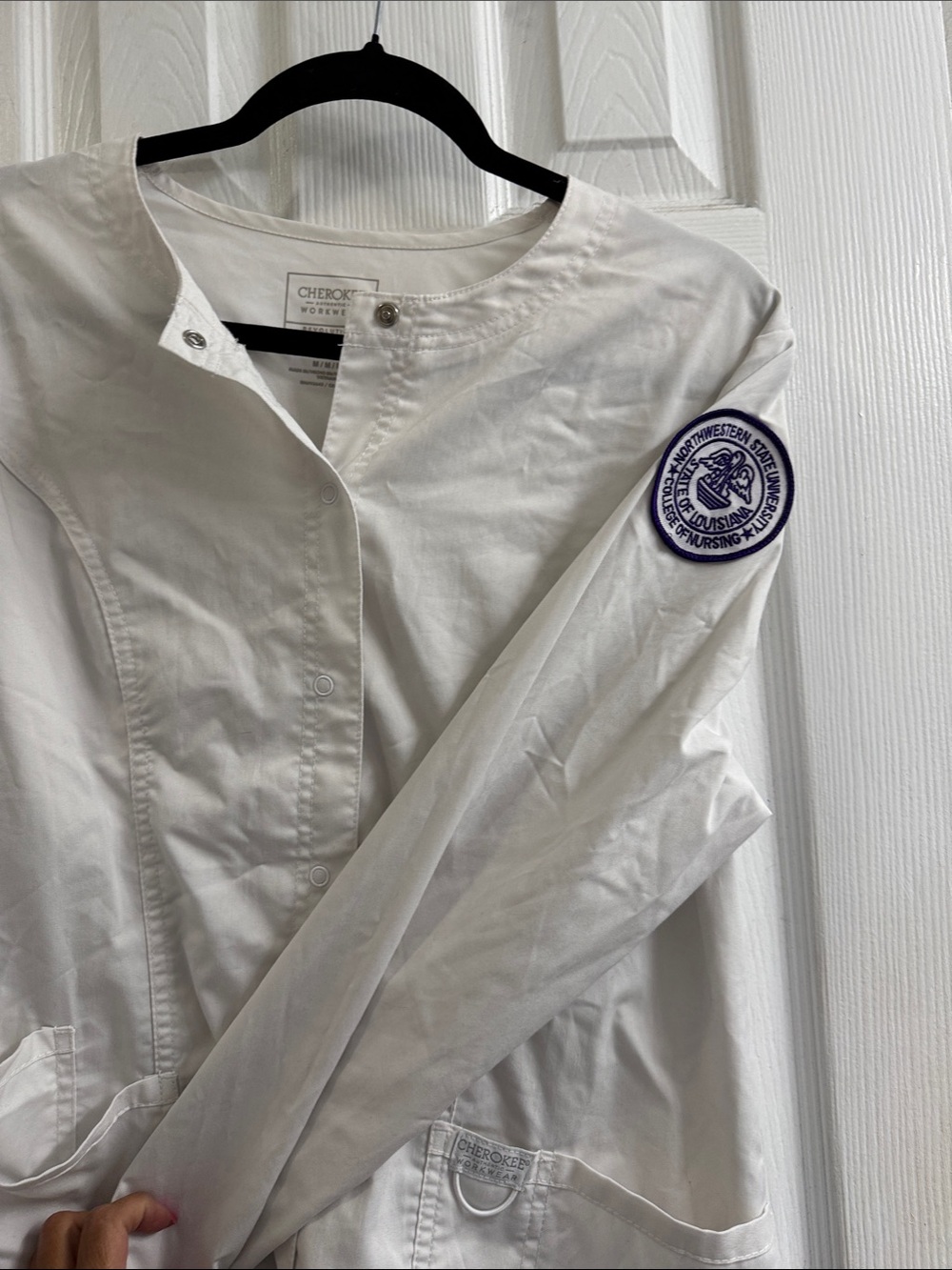 Cherokee White Snap-Front Utility Jacket with Front Pockets. Northwestern patch